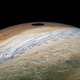 Image for article titled NASA’s Juno orbiter has captured a solar eclipse on Jupiter